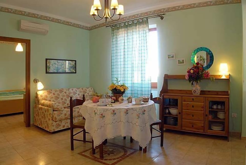 Apartment, 1 Bedroom | Living area | TV