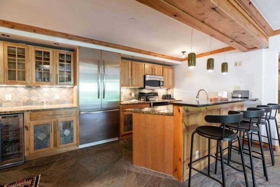 Condo, 2 Bedrooms | Private kitchen | Fridge, oven, coffee/tea maker, toaster