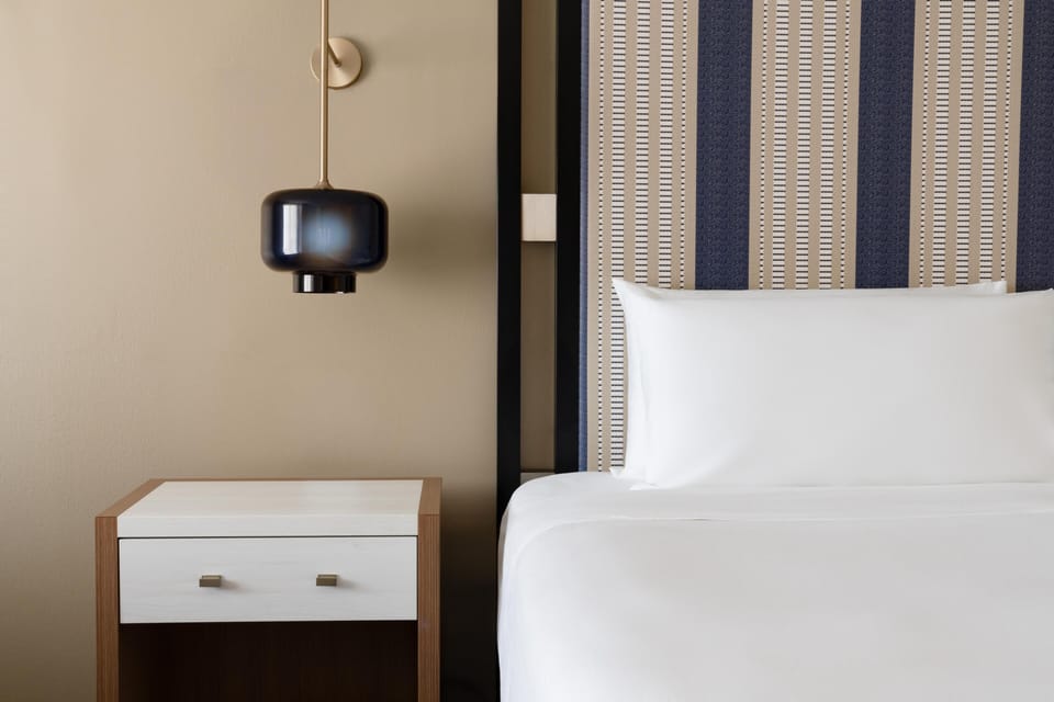 Premium bedding, down comforters, in-room safe, desk