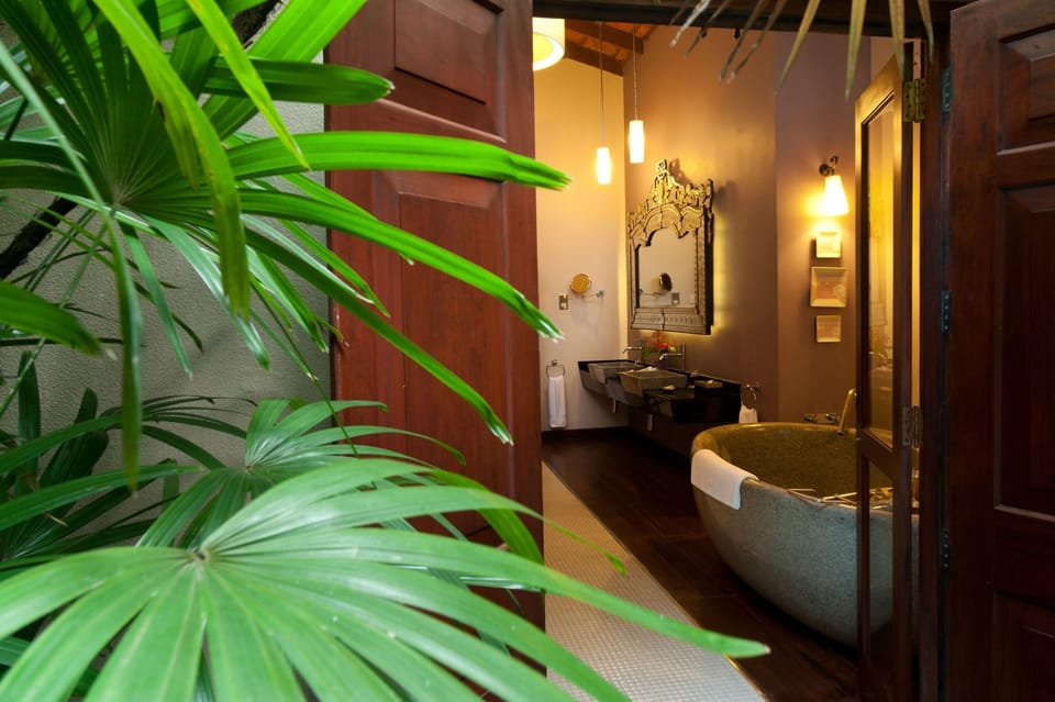 Separate tub and shower, deep soaking tub, designer toiletries