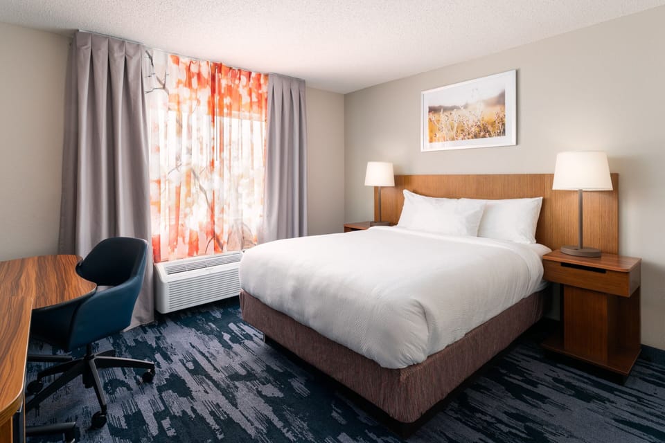 Room, 1 Queen Bed | Desk, laptop workspace, blackout drapes, iron/ironing board