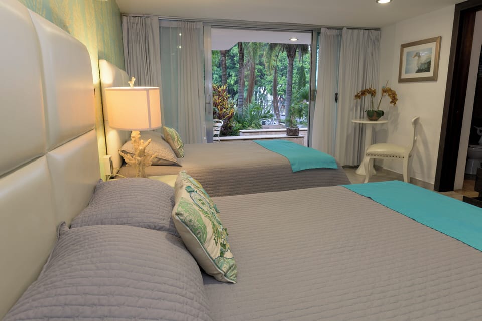 Junior Suite Pool View | Premium bedding, down comforters, pillowtop beds, minibar