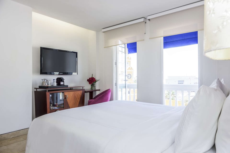 Deluxe Room, Balcony | Premium bedding, minibar, in-room safe, desk