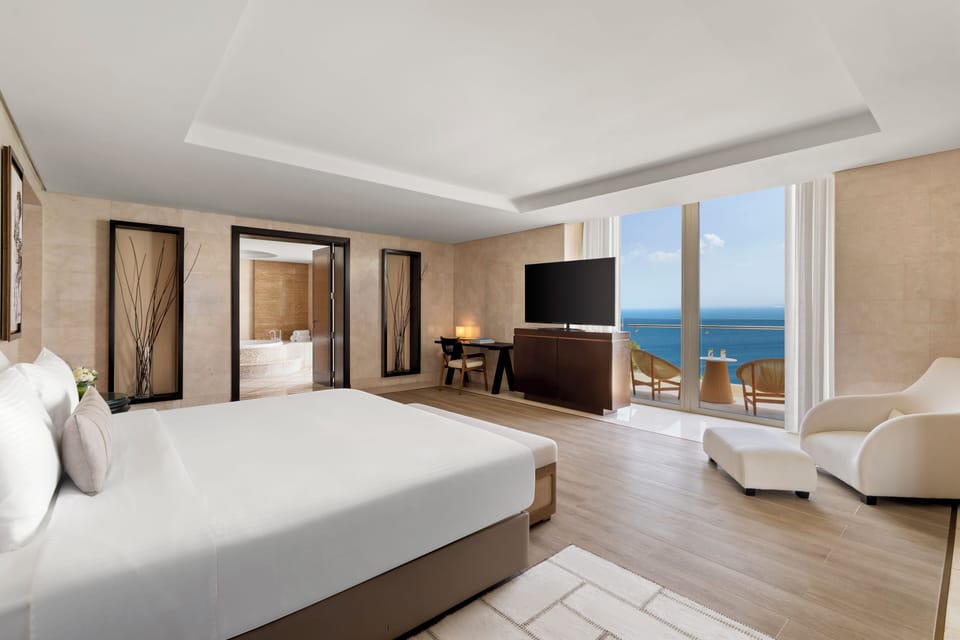 Premium bedding, down comforters, Select Comfort beds, minibar