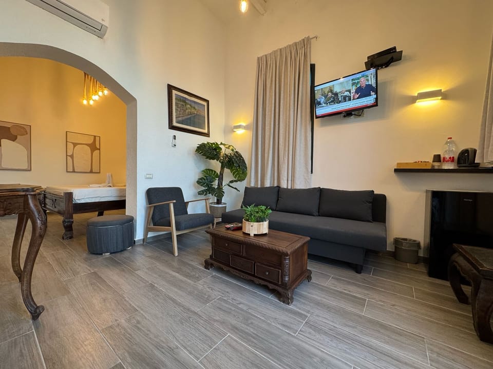 Premium Suite, Lake View | Minibar, in-room safe, desk, laptop workspace