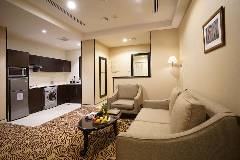 Junior Suite, 1 Double Bed | Living area | TV