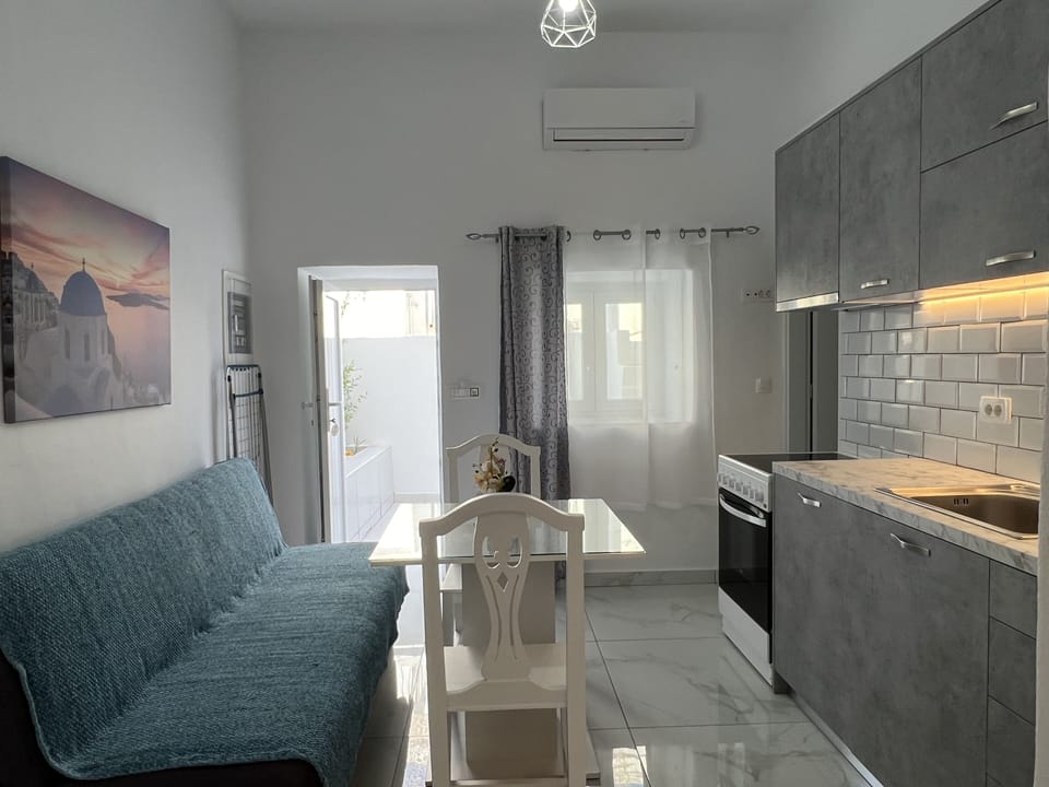 Superior Double Room, Balcony, Ground Floor | Private kitchen | Fridge, electric kettle