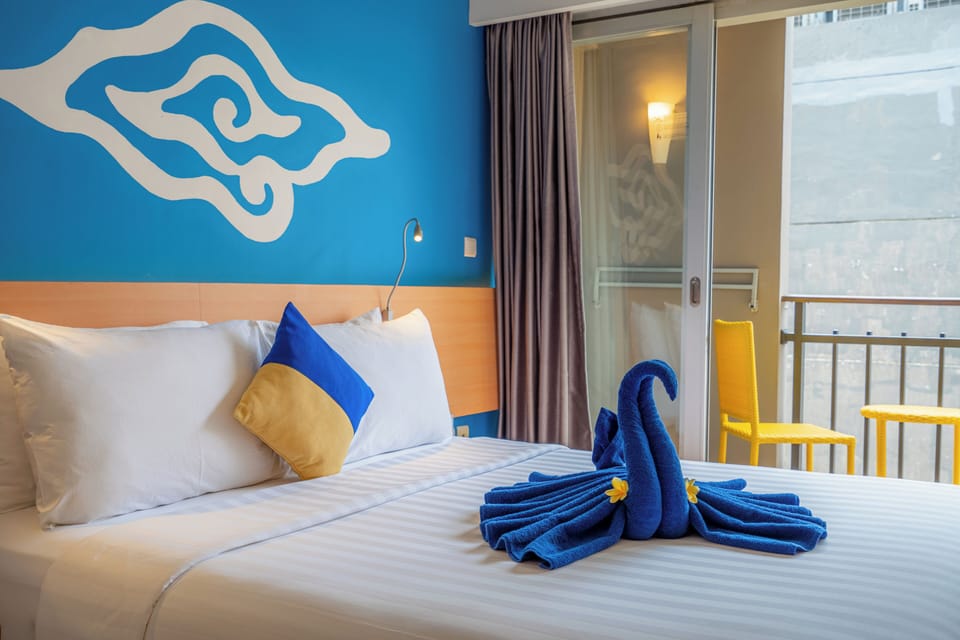 Deluxe Room, Balcony (Free Beer - Welcome Drink) | Minibar, in-room safe, iron/ironing board (on request), WiFi (free)