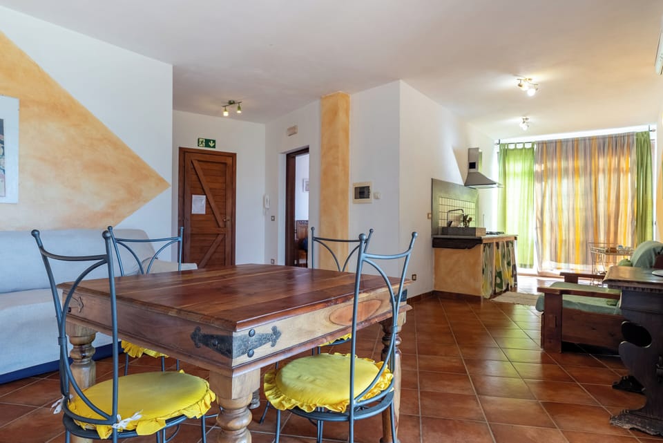 Superior Apartment, 2 Bedrooms, Patio, Partial Sea View | Living area | 30-inch TV with satellite channels