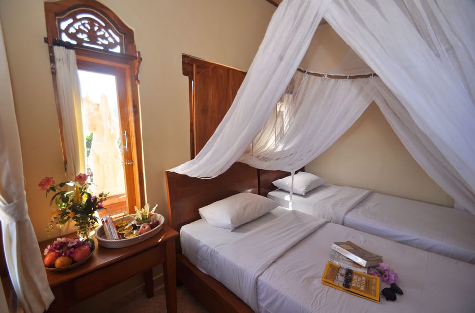 Desk, laptop workspace, free WiFi, bed sheets