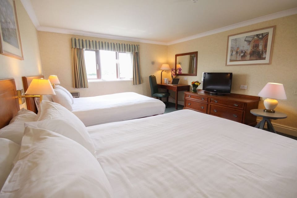 1 bedroom, desk, alarm clocks, bed sheets
