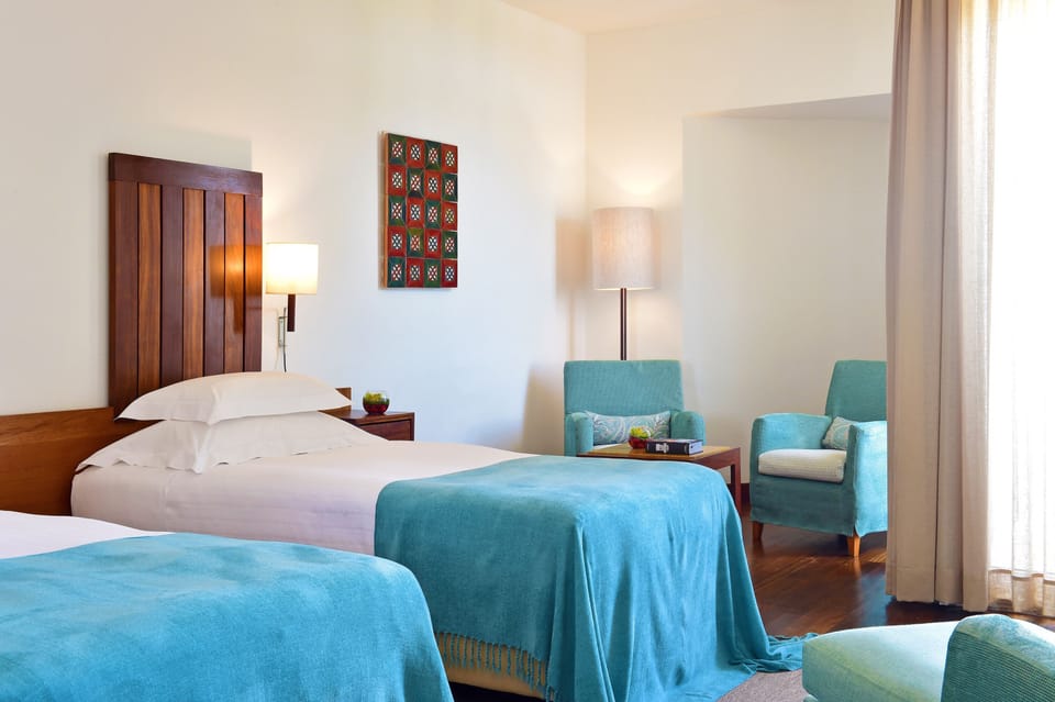 Hypo-allergenic bedding, minibar, in-room safe, desk