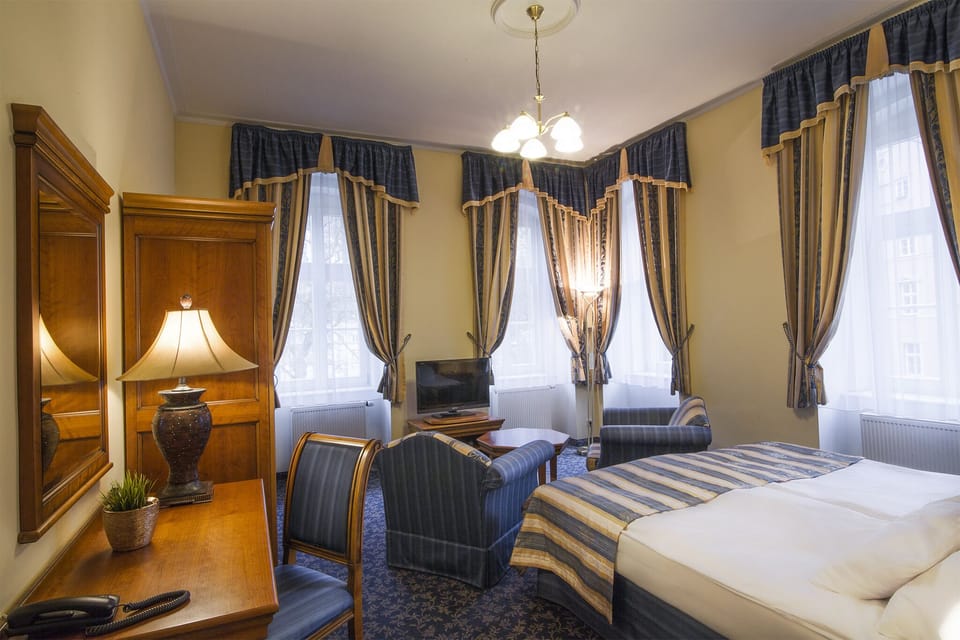 Comfort Apartment | In-room safe, desk, blackout drapes, iron/ironing board
