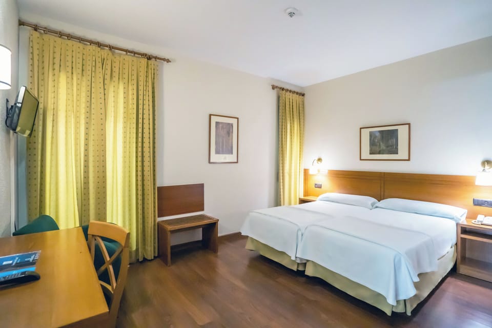Double or Twin Room | Individually decorated, desk, blackout drapes, free WiFi