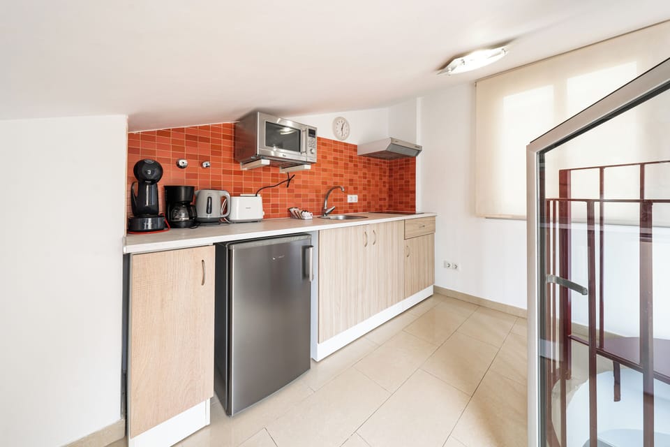 Fridge, microwave, electric kettle, toaster