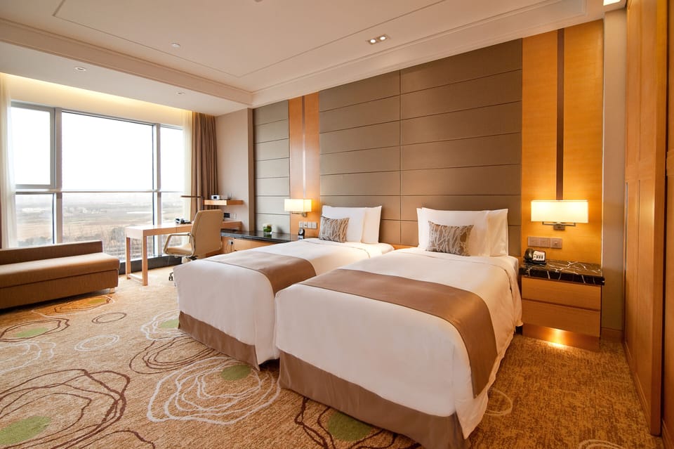 Standard Room | 1 bedroom, minibar, in-room safe, individually furnished