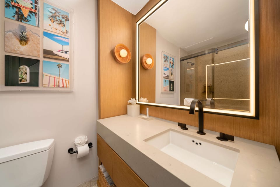 Deluxe Loft- 1 King | Bathroom | Designer toiletries, hair dryer, bathrobes, towels