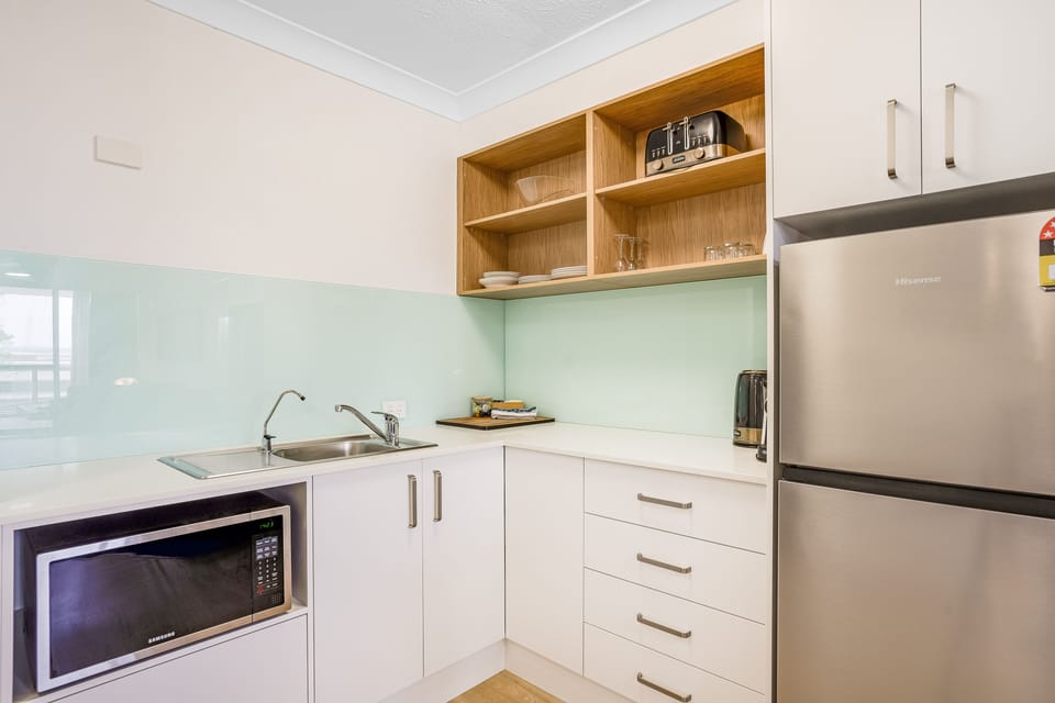 Standard Apartment | Private kitchenette | Coffee/tea maker, mini-fridge, microwave, electric kettle