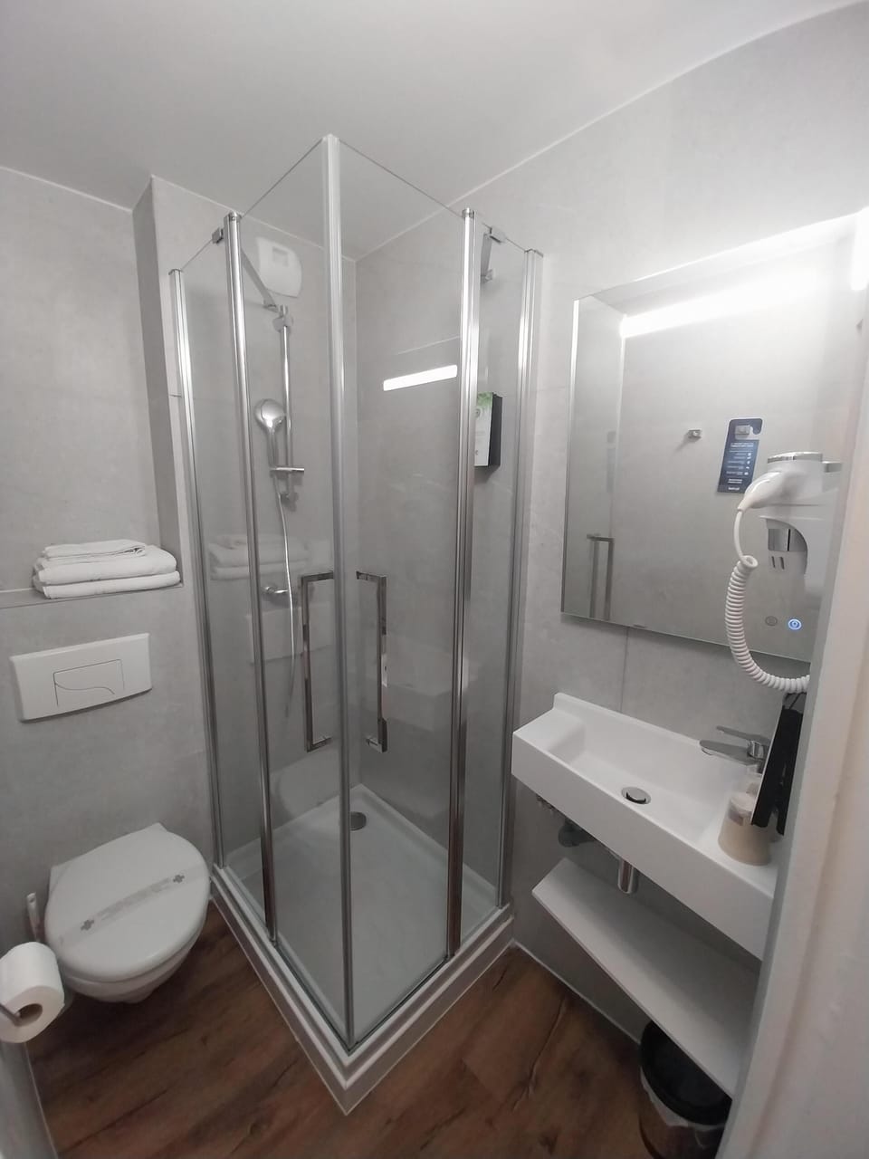 Shower, rainfall showerhead, eco-friendly toiletries, hair dryer
