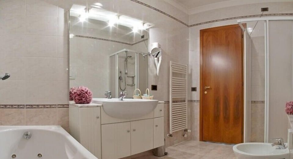 Shower, free toiletries, hair dryer, slippers