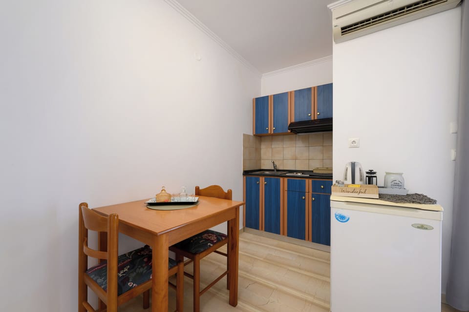 Studio (2 adults) | Private kitchen | Fridge, electric kettle, toaster, highchair