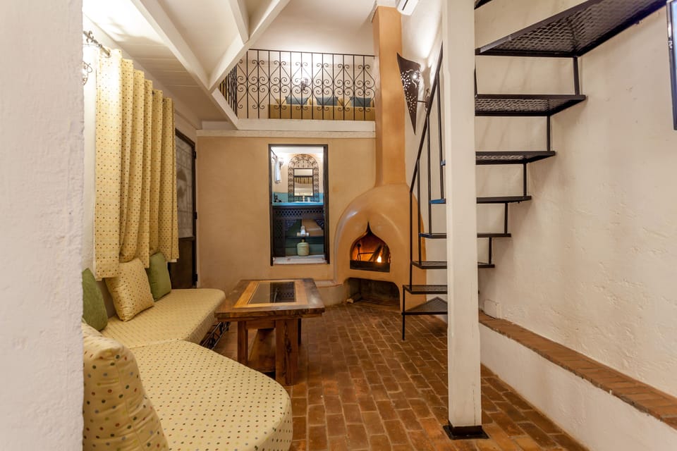 Family Quadruple Room | Minibar, in-room safe, individually decorated, individually furnished