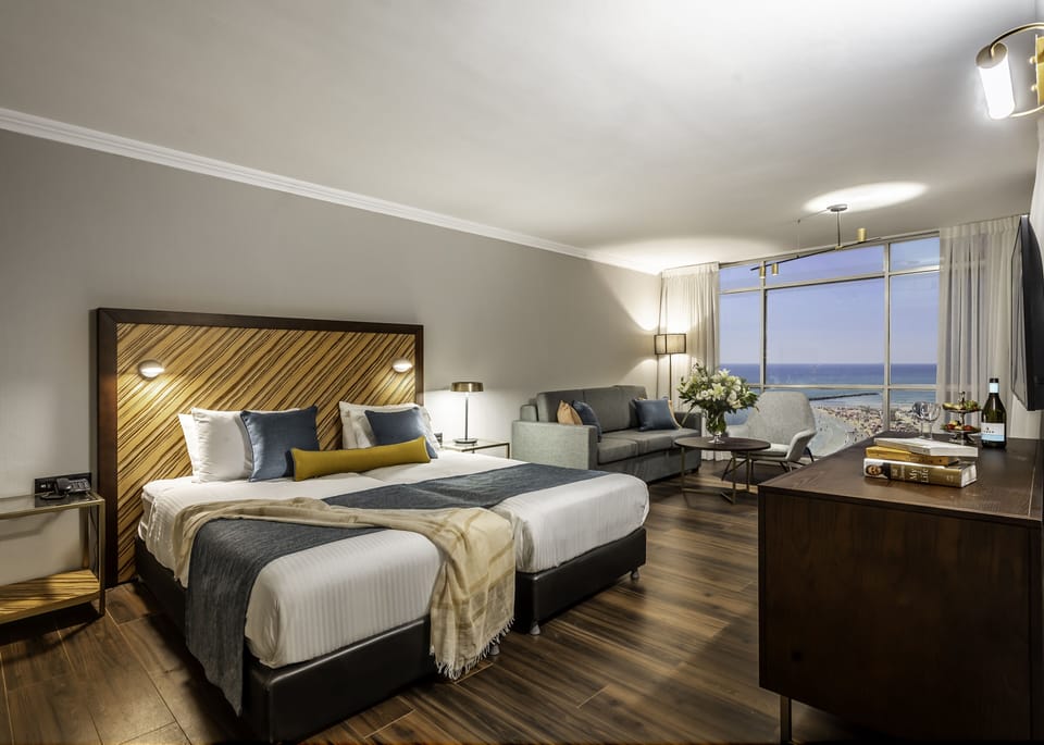 Premier Studio, Balcony, Sea View | Minibar, in-room safe, desk, laptop workspace