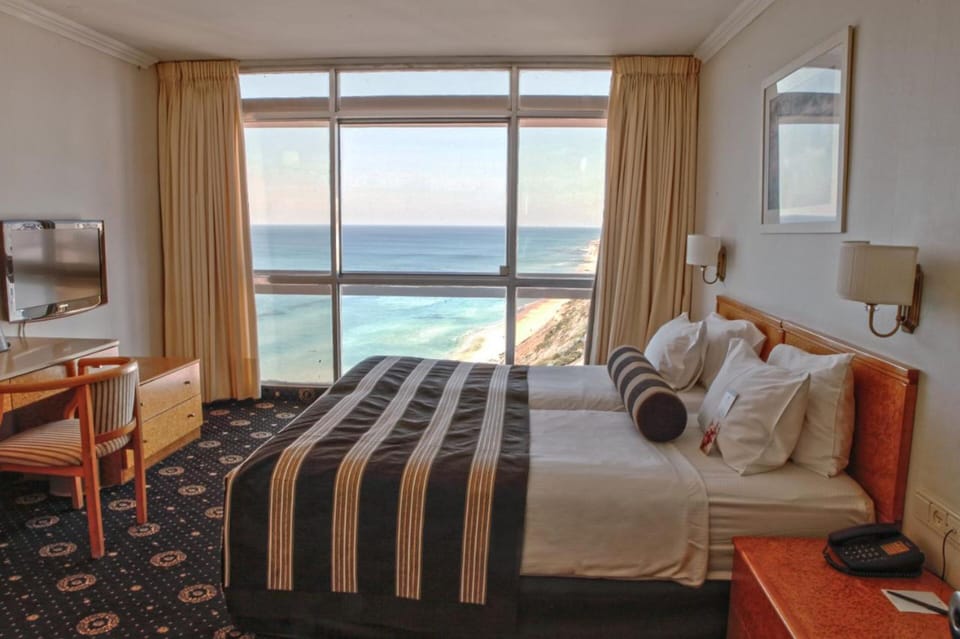 Junior Suite, Balcony, Sea View | Minibar, in-room safe, desk, laptop workspace
