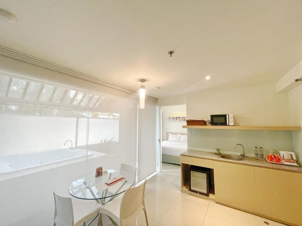 Suite, 2 Queen Beds (HARRIS Sunset) | Living area | LCD TV