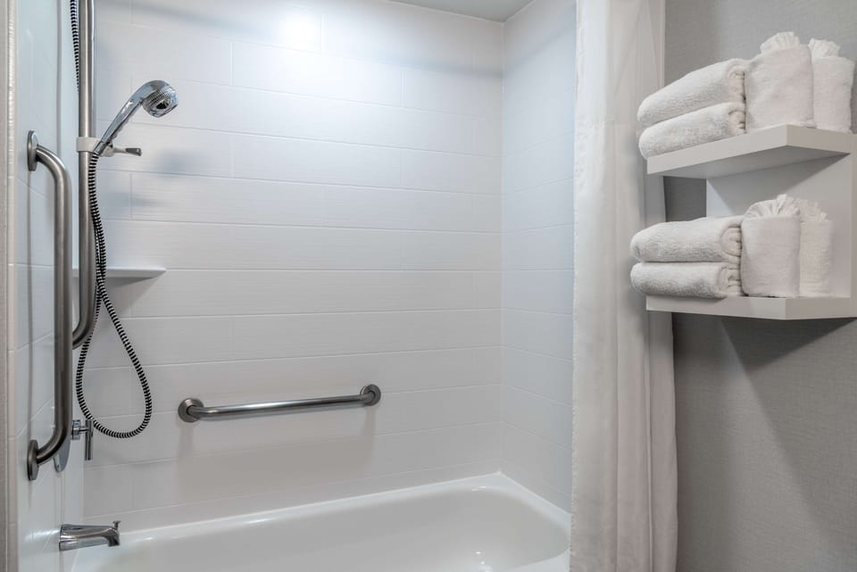 Room, 1 King Bed, Accessible | Bathroom | Combined shower/tub, free toiletries, hair dryer, towels