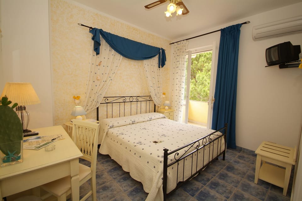 Classic Double or Twin Room, Sea View | Minibar, in-room safe, desk, free WiFi