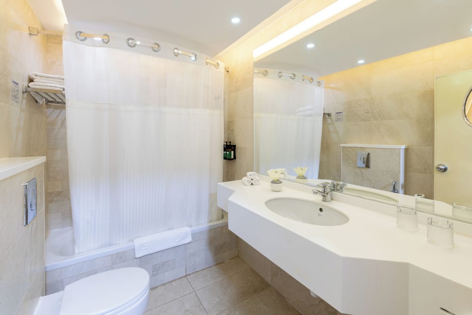 Superior Chalet | Bathroom | Bathtub, hair dryer, bathrobes, slippers