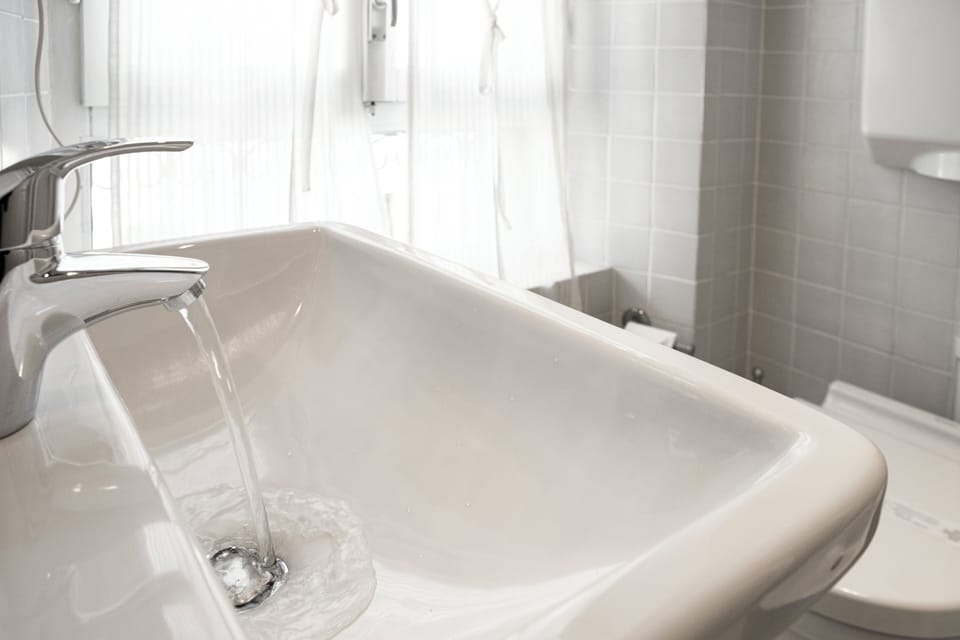 Suite, City View | Bathroom | Designer toiletries, hair dryer, slippers, bidet