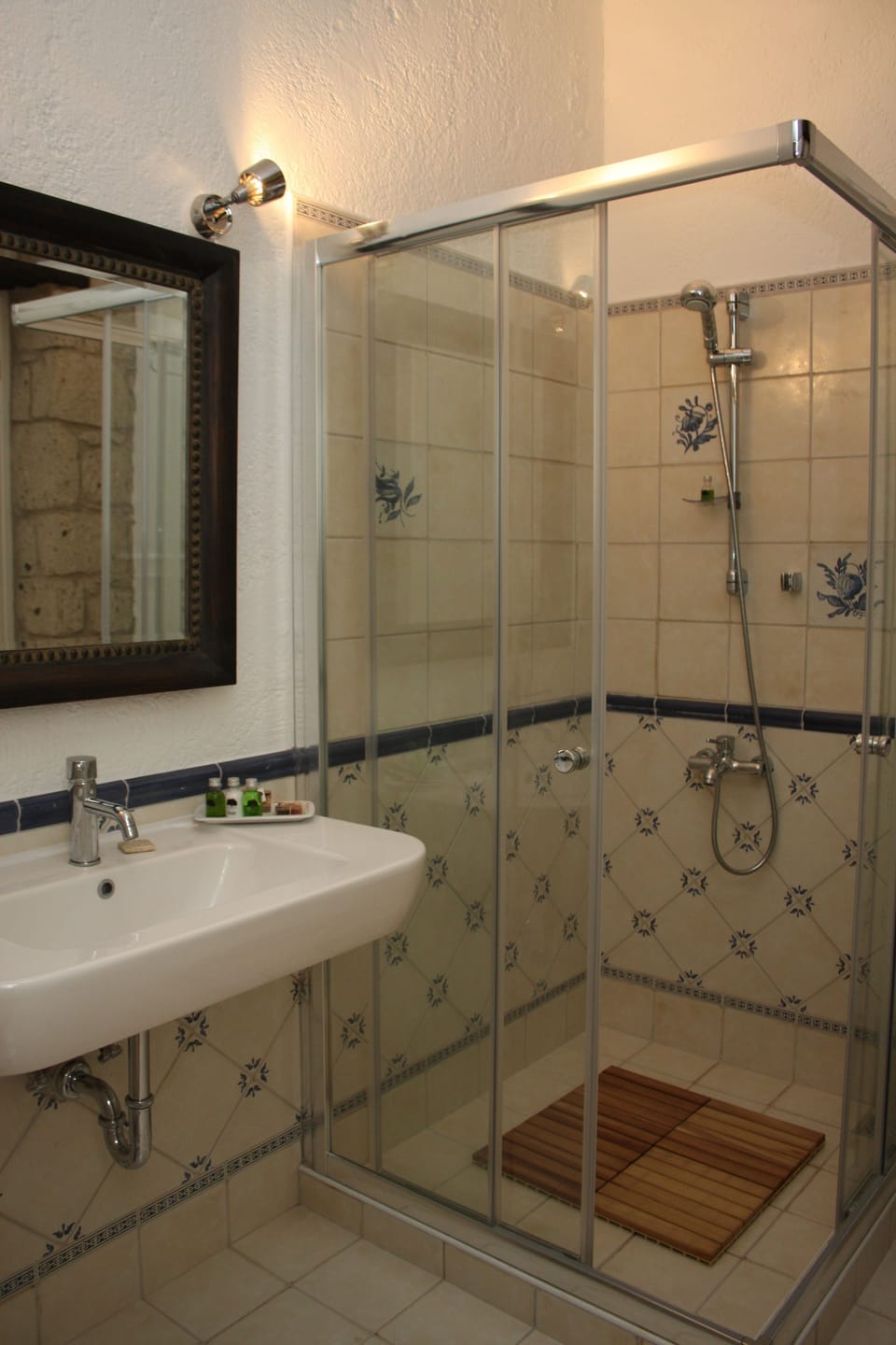 Shower, free toiletries, hair dryer, slippers