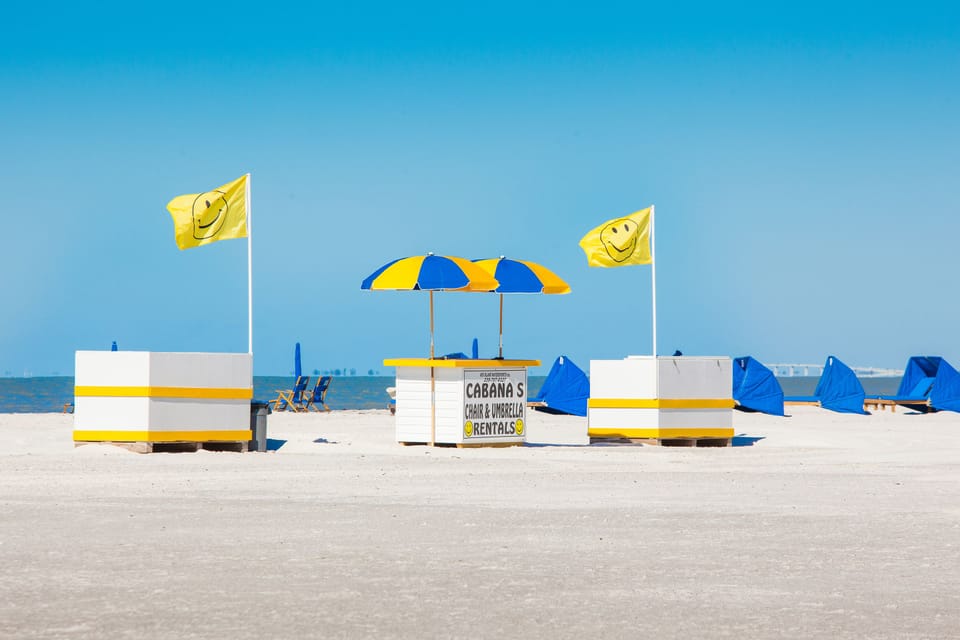On the beach, sun loungers, beach umbrellas, beach volleyball