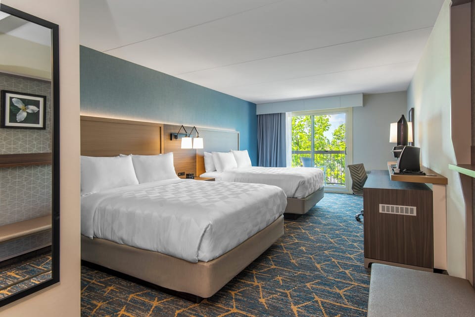 Hypo-allergenic bedding, desk, blackout drapes, soundproofing