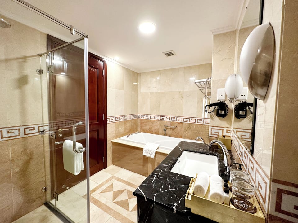 Executive Premium Twin | Bathroom | Free toiletries, hair dryer, bathrobes, slippers