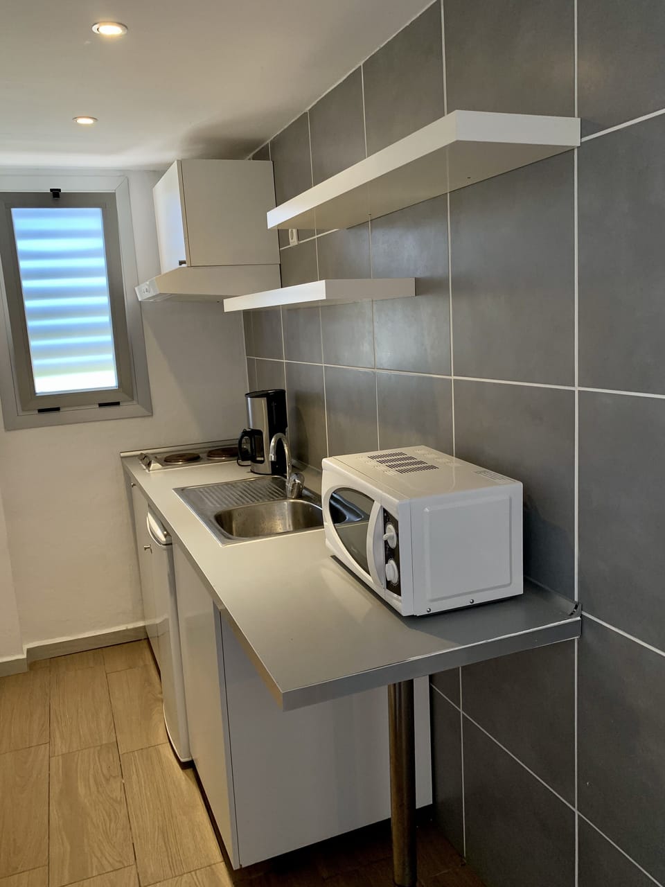 Deluxe Apartment, 2 Bedrooms, Balcony | Private kitchen | Full-size fridge, microwave, stovetop, coffee/tea maker