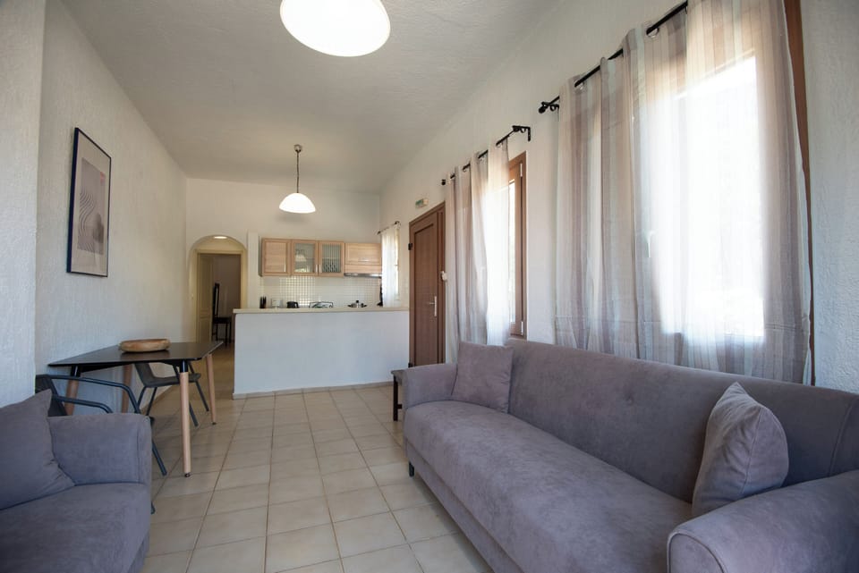 Apartment, Garden View | Private kitchen | Fridge, microwave, stovetop, coffee/tea maker