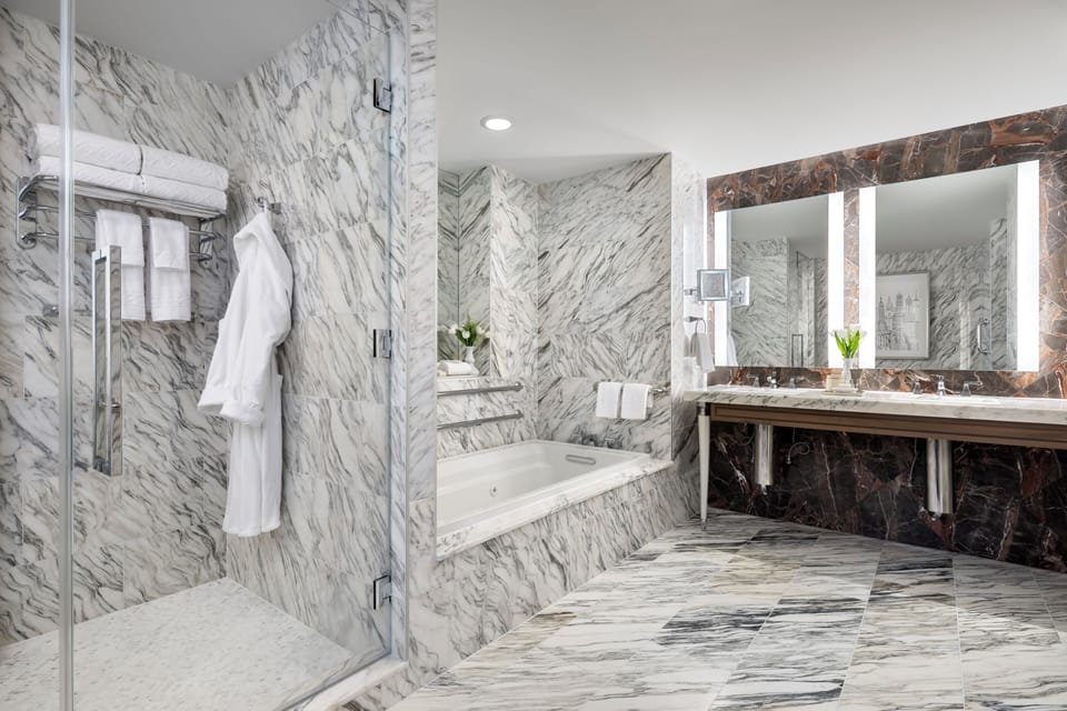 Designer toiletries, hair dryer, bathrobes, slippers