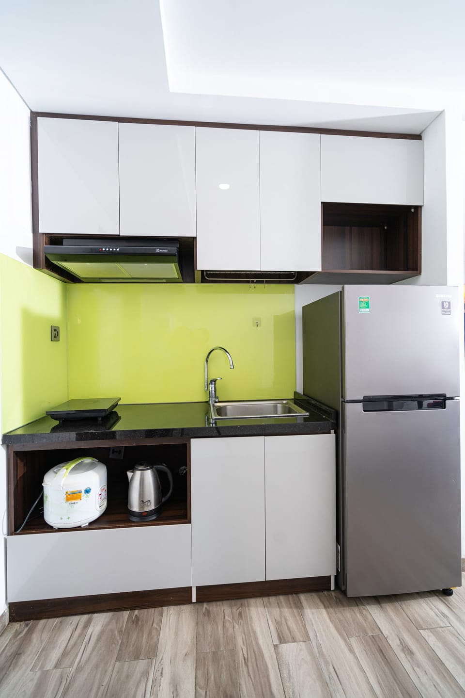 Deluxe Apartment, 1 Bedroom | Private kitchen | Mini-fridge, electric kettle, cleaning supplies, paper towels