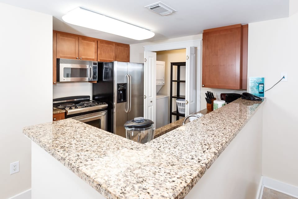 Condo | Private kitchen | Stovetop, toaster, cookware/dishes/utensils