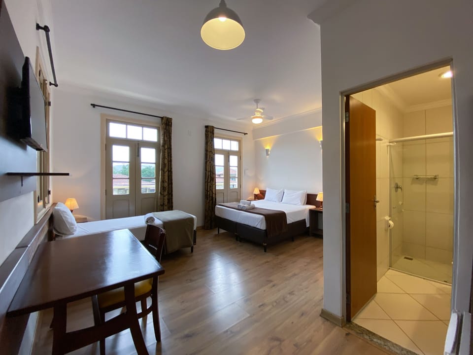 Comfort Triple Room | Minibar, desk, laptop workspace, soundproofing