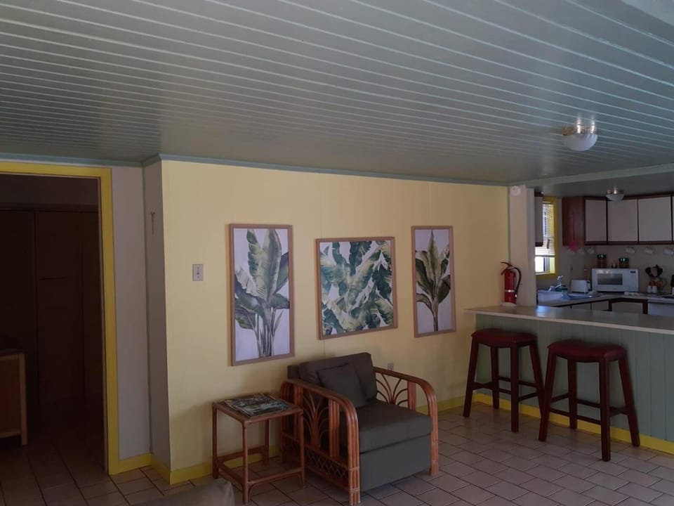 Standard Villa, 3 Bedrooms | Living room | 40-inch LED TV with cable channels, TV