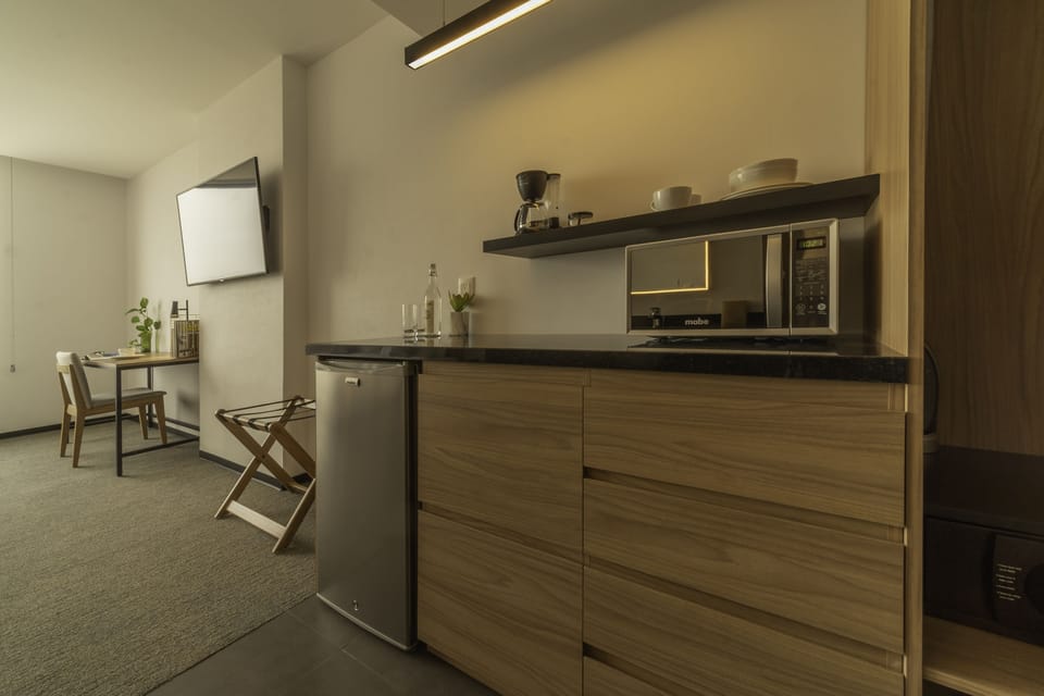 Mini-fridge, microwave, coffee/tea maker, toaster