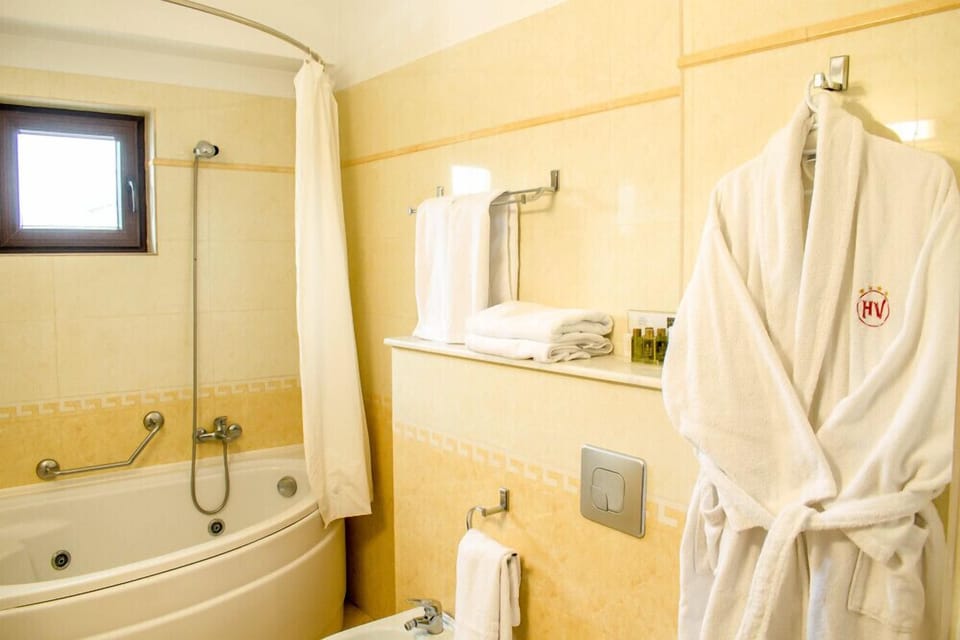 Jetted tub, free toiletries, hair dryer, bathrobes