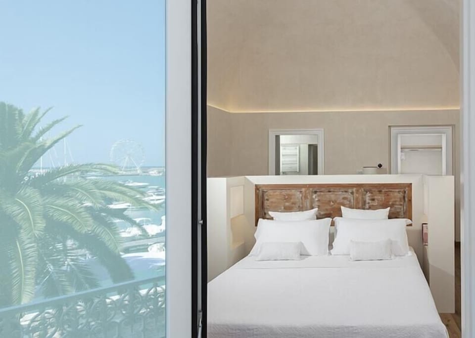 Executive Quadruple Room, Balcony, Harbor View (Le Sciale) | Premium bedding, memory foam beds, minibar, in-room safe