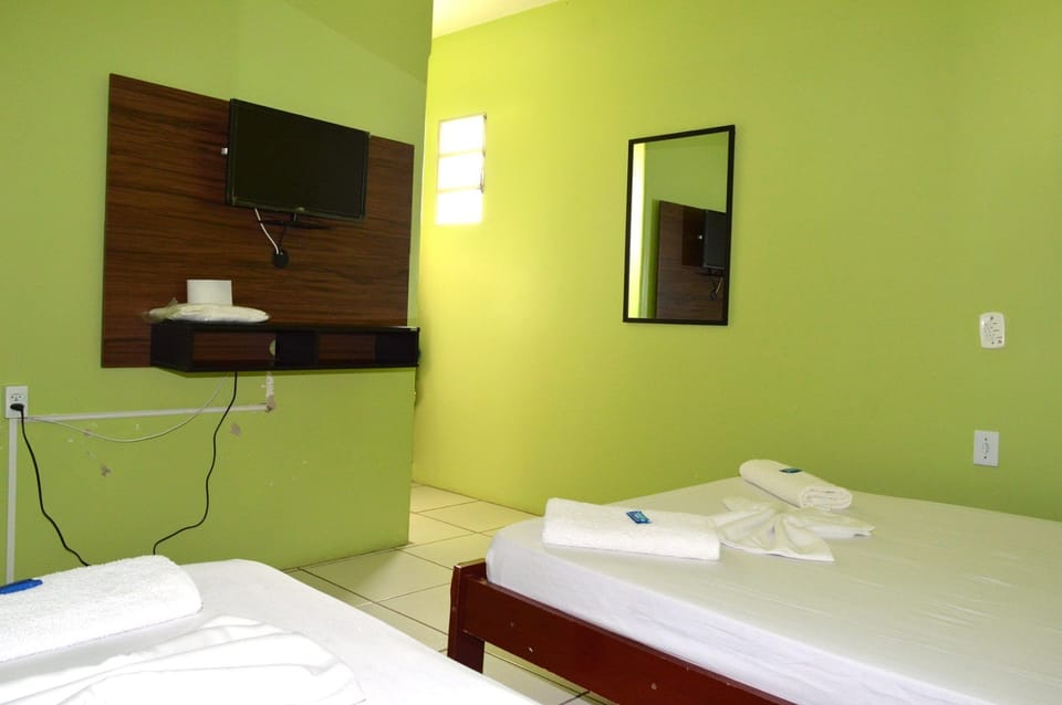 Quarto Quadruplo com Ar Condicionado | Free WiFi