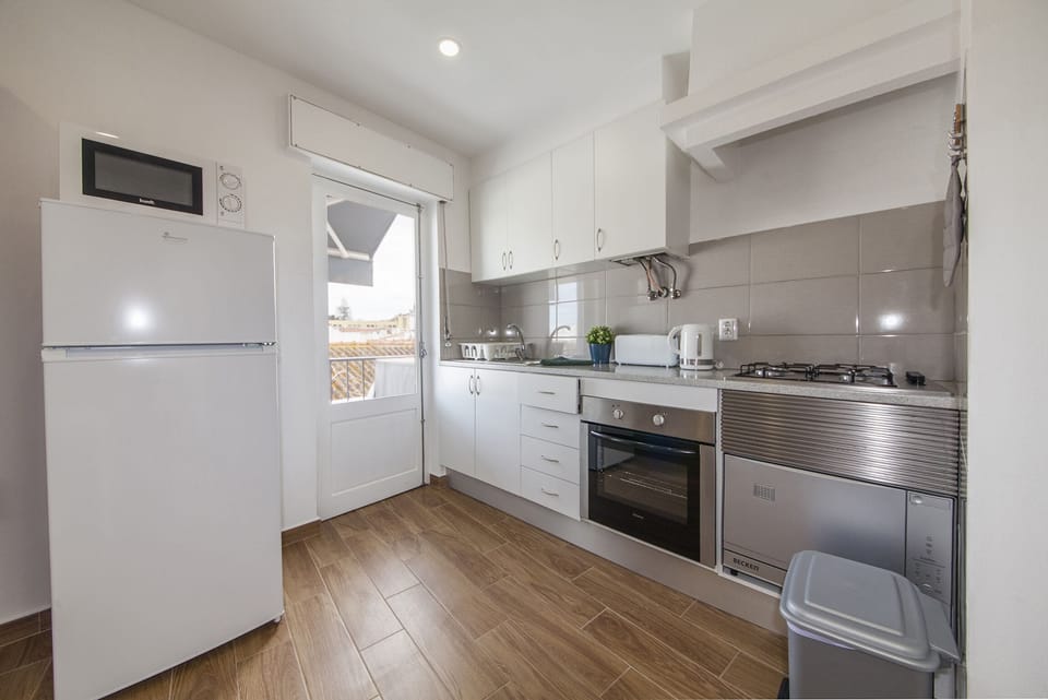 Apartment, 1 Bedroom | Private kitchen | Full-size fridge, microwave, electric kettle, toaster