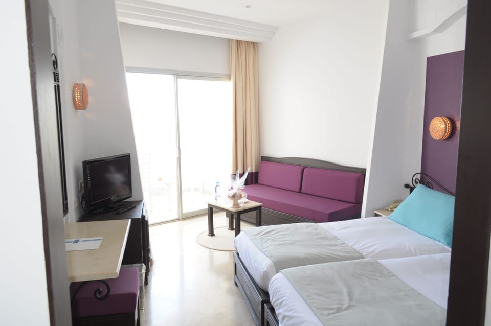 Select Comfort beds, minibar, in-room safe, desk